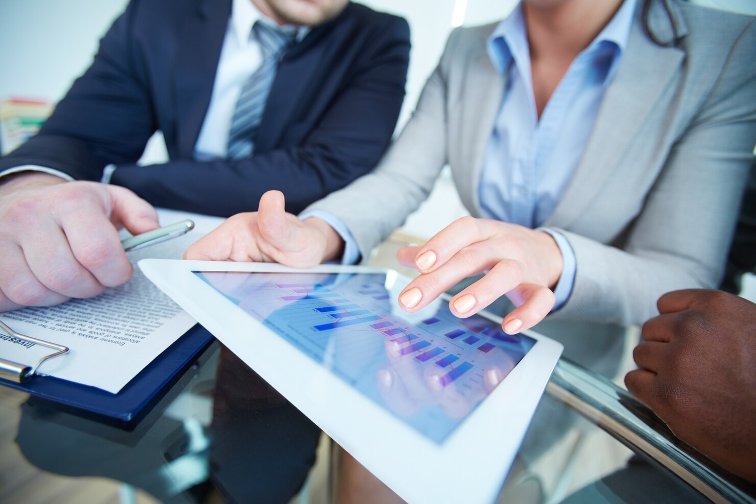 Business professionals analyzing data
